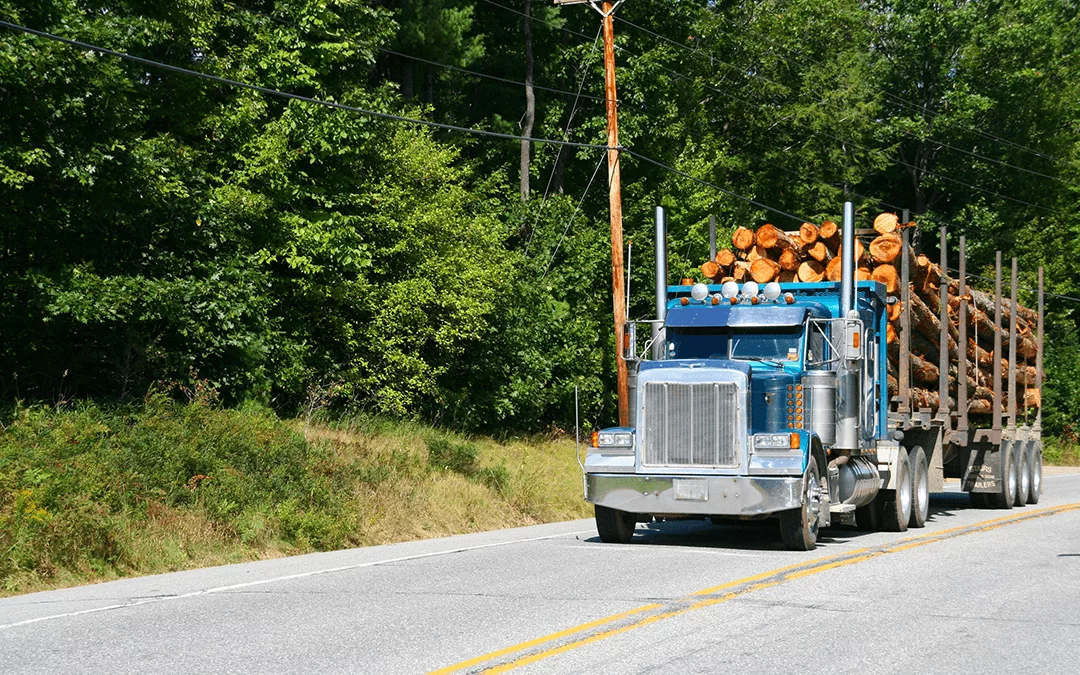 Logging truck on highway | Wiers